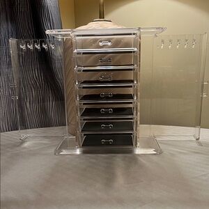 Plexiglass jewellery chests.